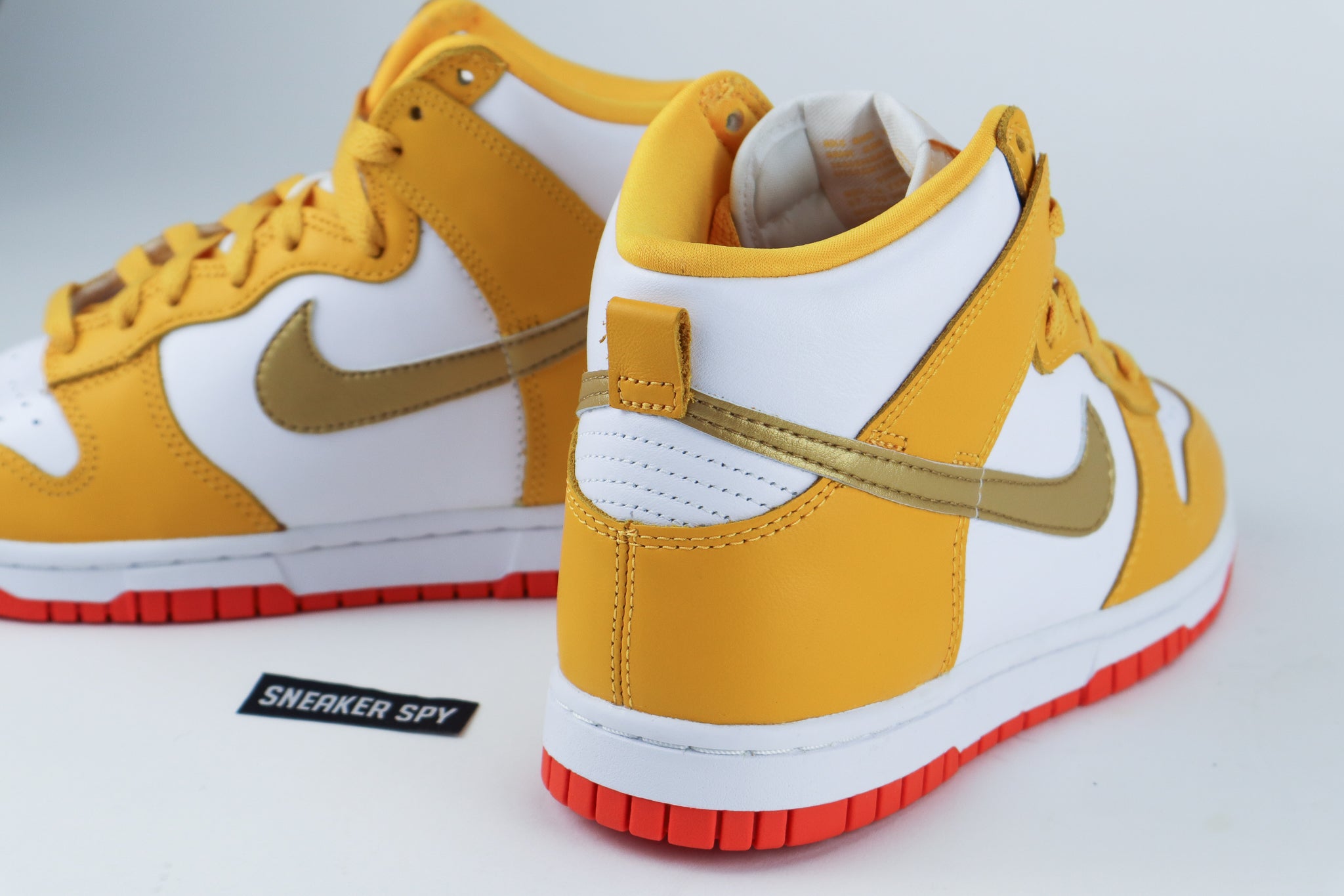 NIKE DUNK HIGH WOMENS "UNIVERSITY GOLD" DQ4691 700