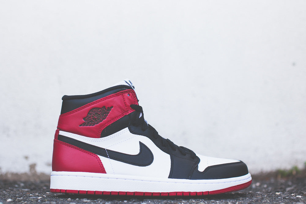 AIR JORDAN RETRO 1 "BLACK TOE" 555088-184 - thesneakerspy